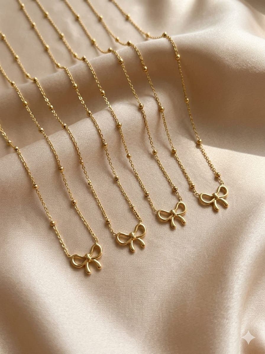 سلسلة فيونكة كيوت بسلسلة خرز - Gold Bow Necklace